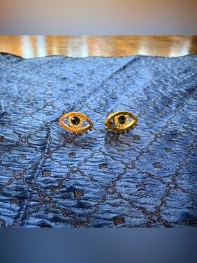Gold-Tone Eye Stud Earrings with Blue Crystal Centers